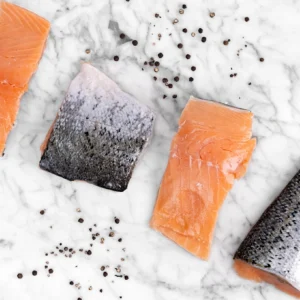 Porciones de Salmón Chileno con Piel por 1KG